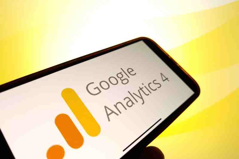 Smartphone showing Google Analytics 4 for website tracking.